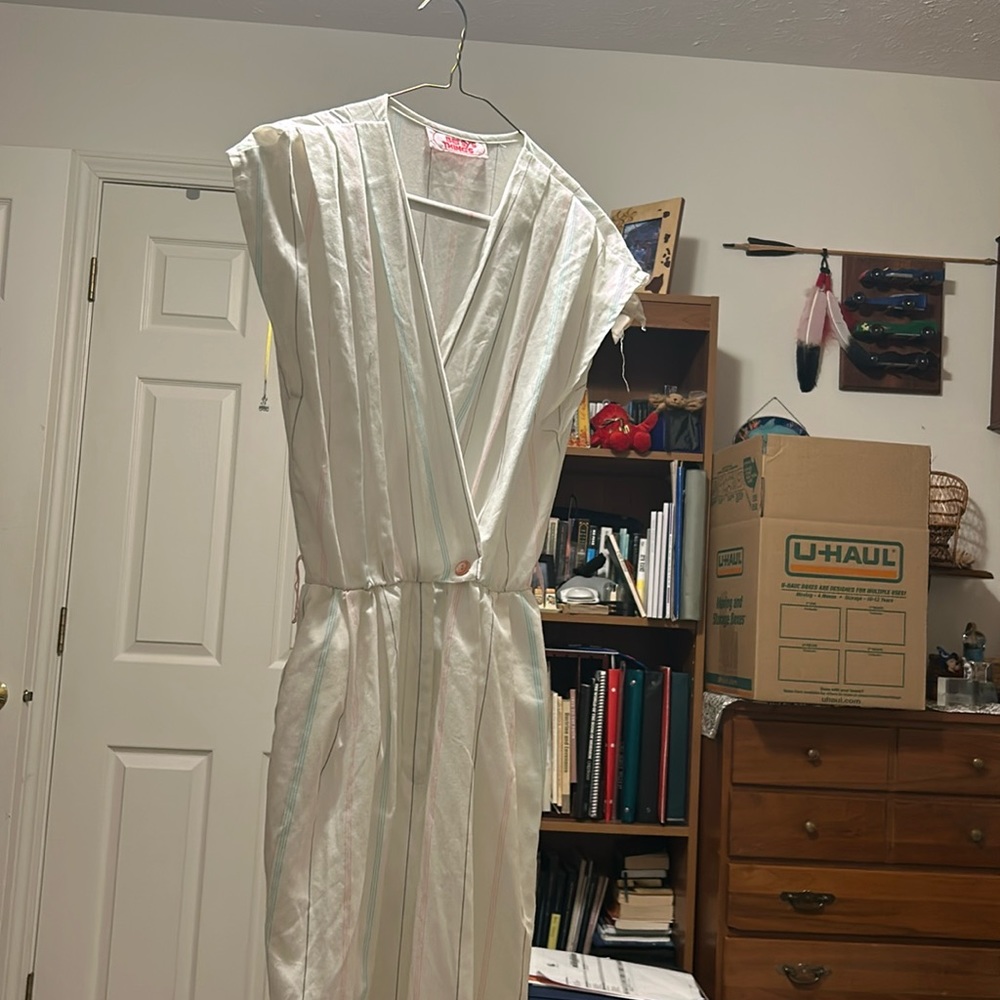 Blue, pink, and purple striped jumpsuit with belt loops
